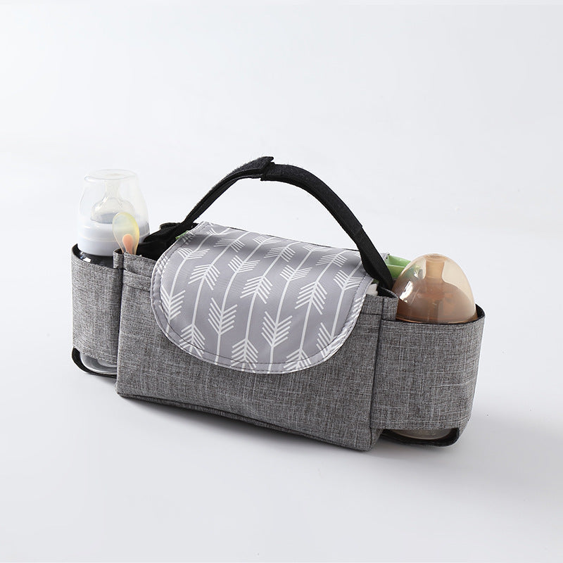 Gray fabric caddy with a patterned flap on a white background