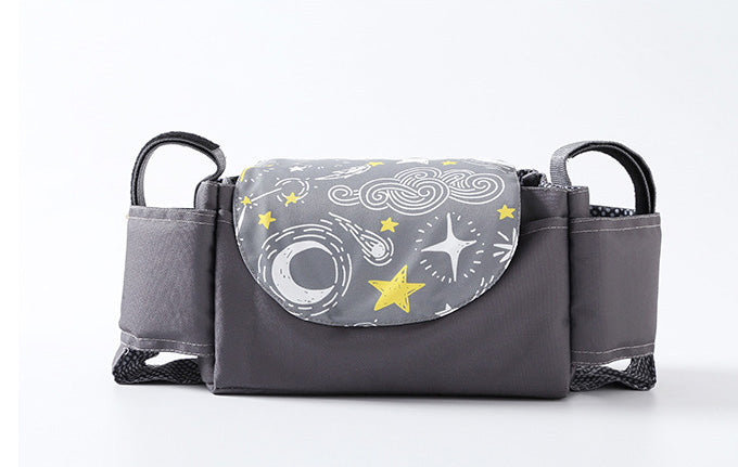 Gray diaper bag with space-themed design on a white background