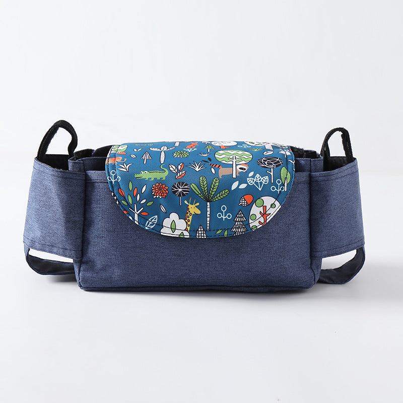 Blue pet carrier with colorful animal pattern on a white background