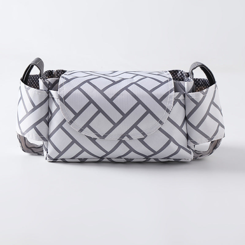 Gray geometric patterned bag on a white background
